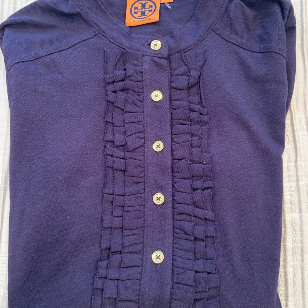 Tory Burch Lidia L/S Navy Polo Shirt with Classic Tory Burch gold butttons.